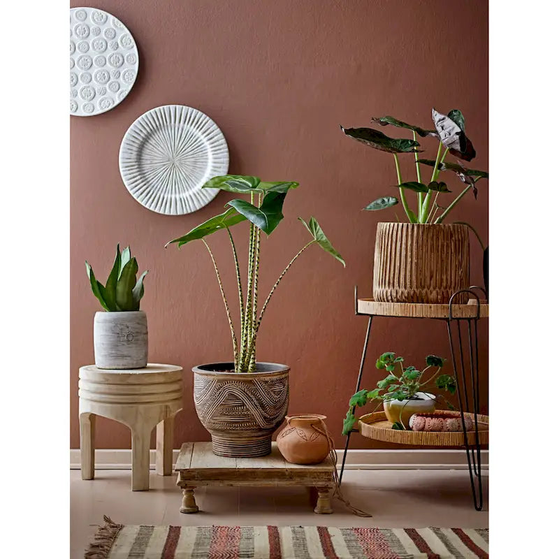 Tabouret rond sculpté en bois de paulownia naturel