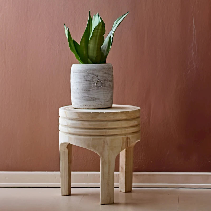 Tabouret rond sculpté en bois de paulownia naturel