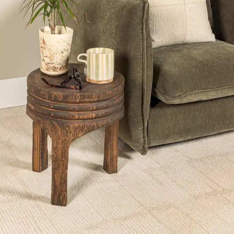 Tabouret rond sculpté en bois de paulownia naturel