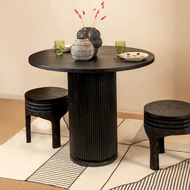 Tabouret rond sculpté en bois de paulownia naturel